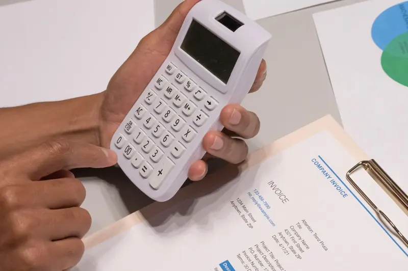 Calcul d'une facture à la calculatrice